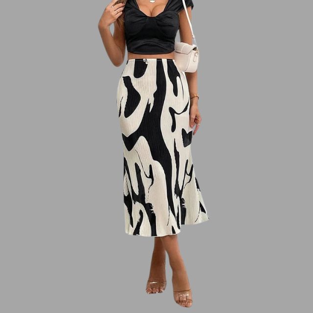 Geplooide midirok met abstracte print