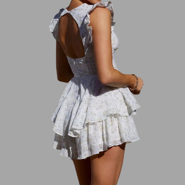 jurk met oogjesborduursel en ruches