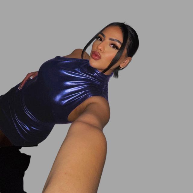 Metallic set bestaande uit een mouwloze top en rok met uitgesneden details