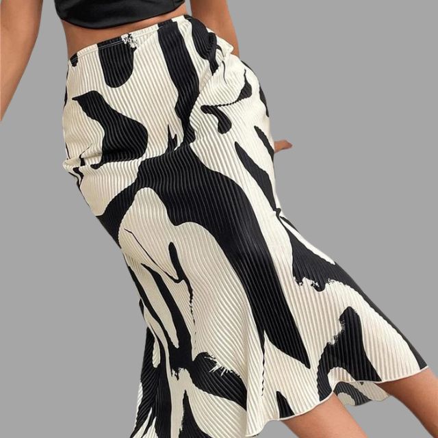 Geplooide midirok met abstracte print