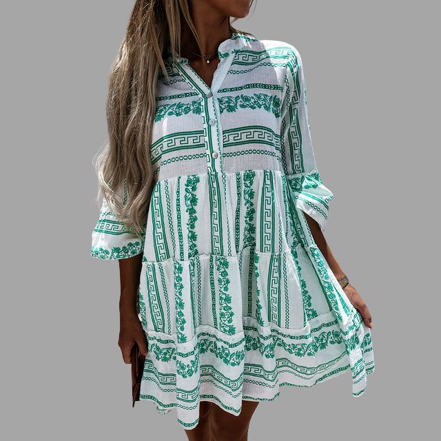 Uitlopende jurk met V-halslijn