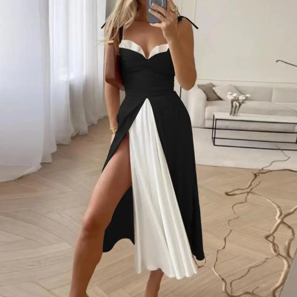 Hoog uitgesneden jurk met kleurblokdessin