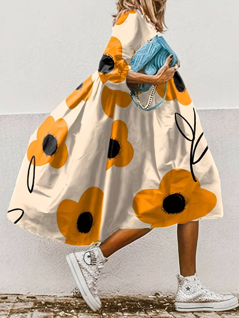 Losvallende jurk met bloemenprint