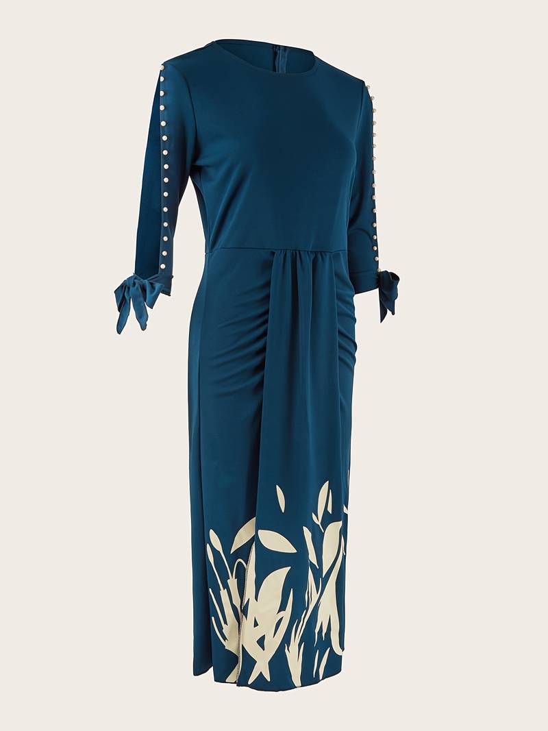 Elegante kralenjurk met mouwen