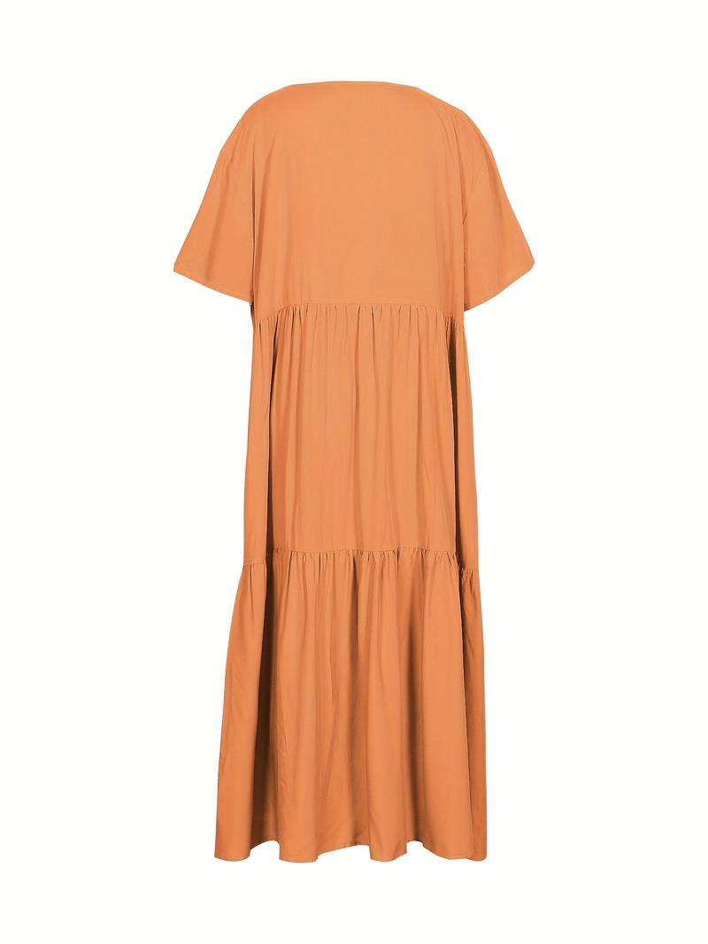 Onregelmatige veelkleurige swingjurk