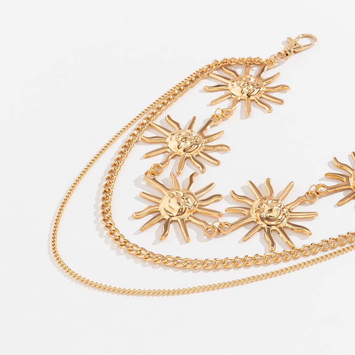 Meerlagige taille ketting met zon hangers