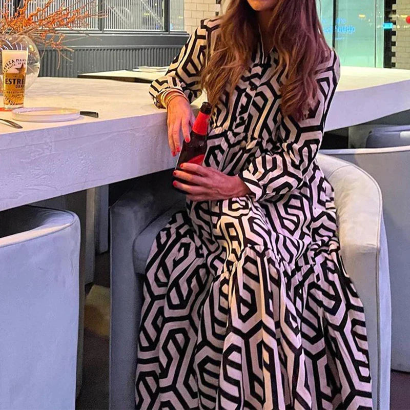 Jurk met lange mouwen en geometrisch patroon