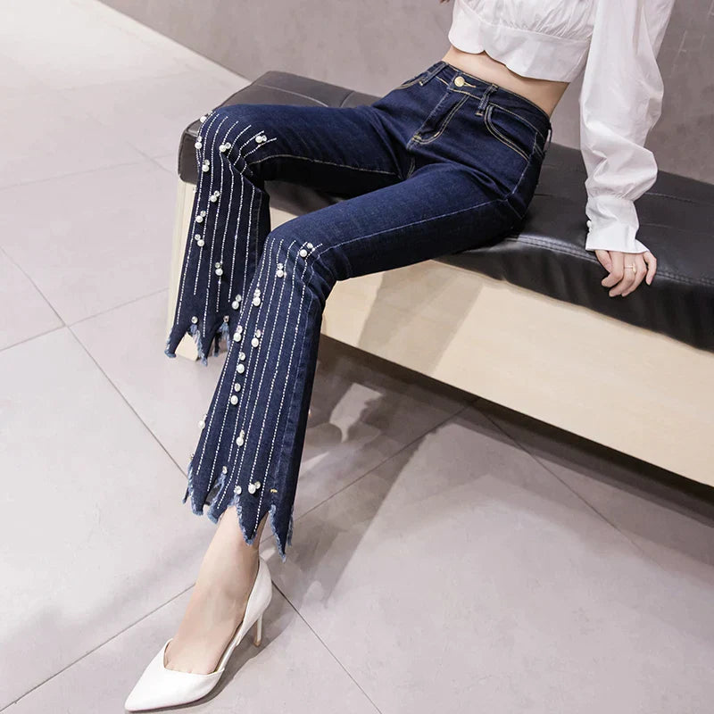 Flare jeans met hoge taille en parelmoeren kwastjesdetail