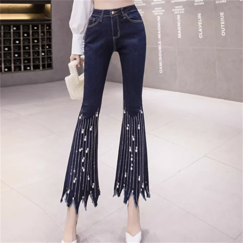 Flare jeans met hoge taille en parelmoeren kwastjesdetail