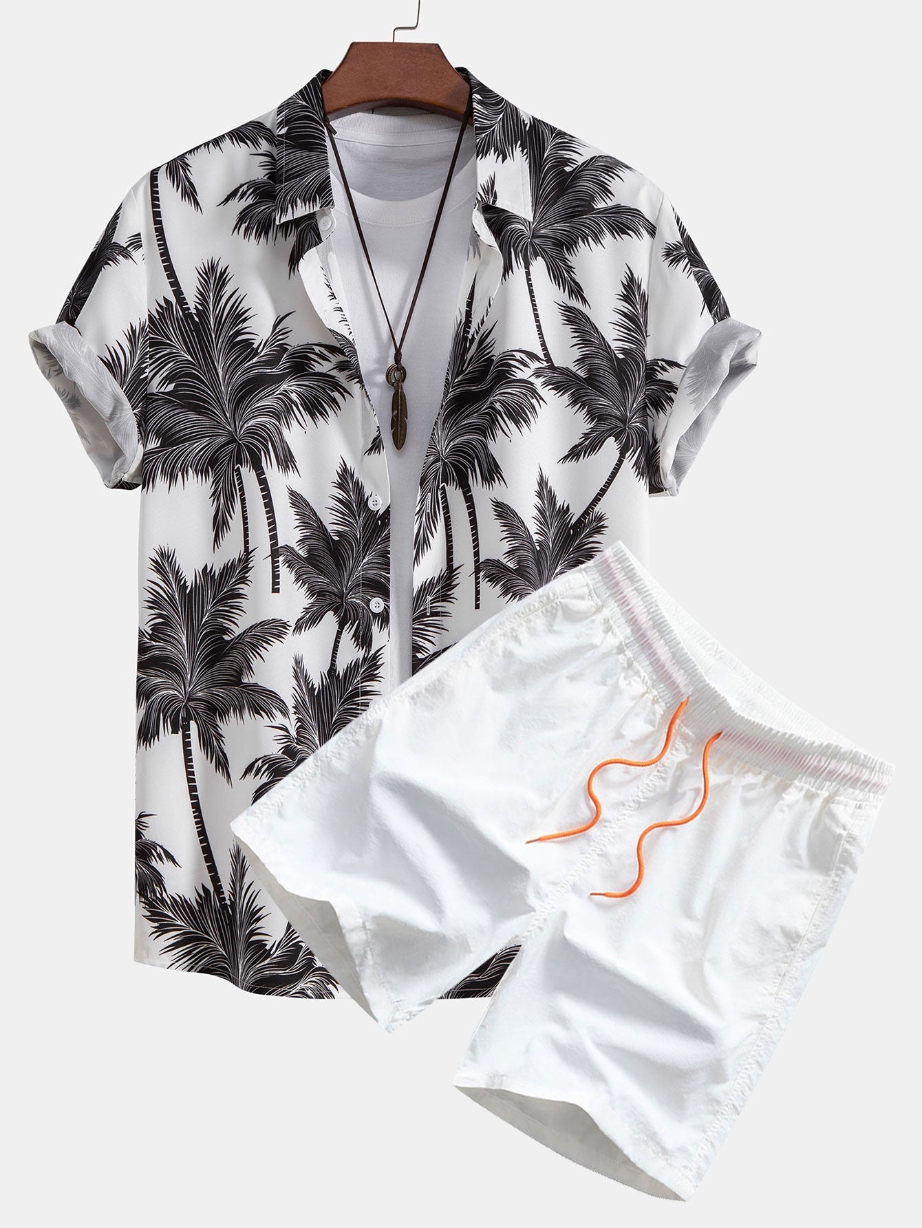 Button-down shirt en zwemshort met palmboomprint