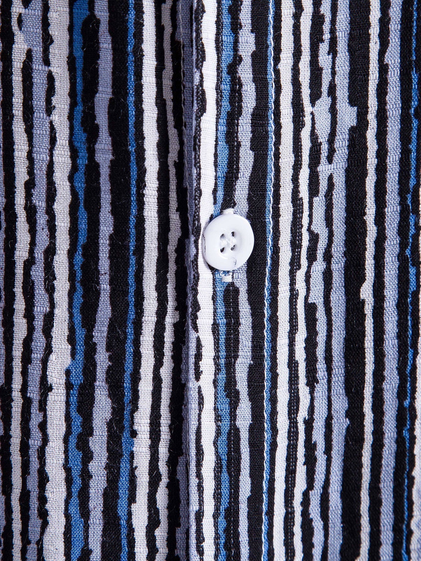 Golvend overhemd met knoopsluiting