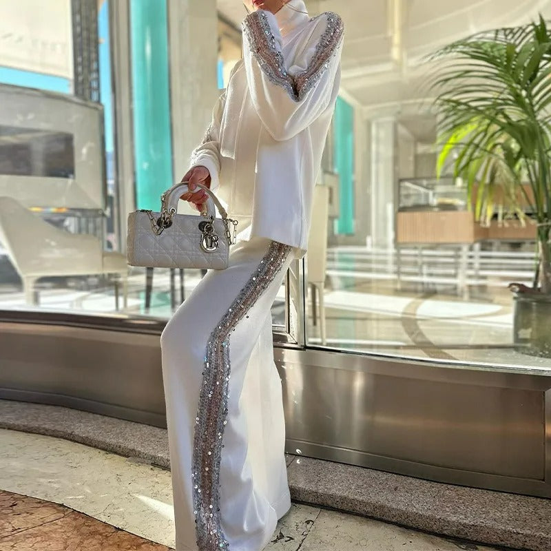 Elegante paillettentrui en patchworkbroek voor dames