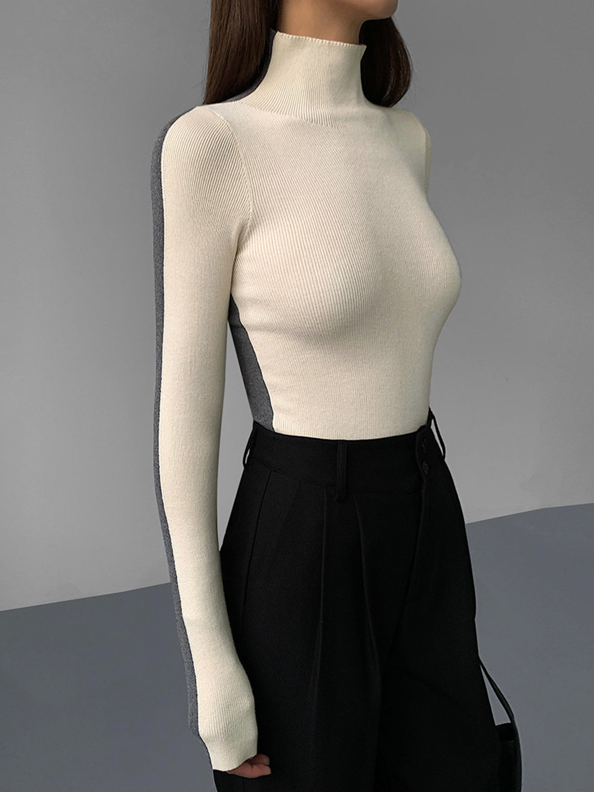 Tweezijdig gebreide trui met lange mouwen in twee kleuren