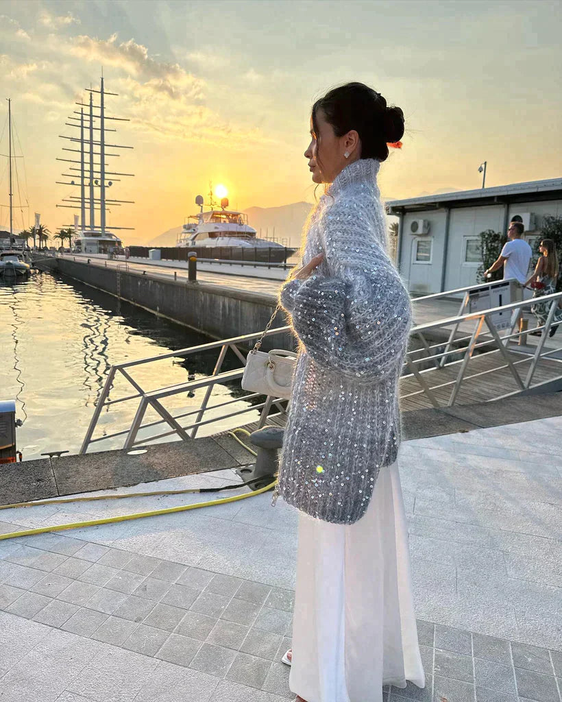 Selina - De elegante, glinsterende vesttrui met zijwaarts vest