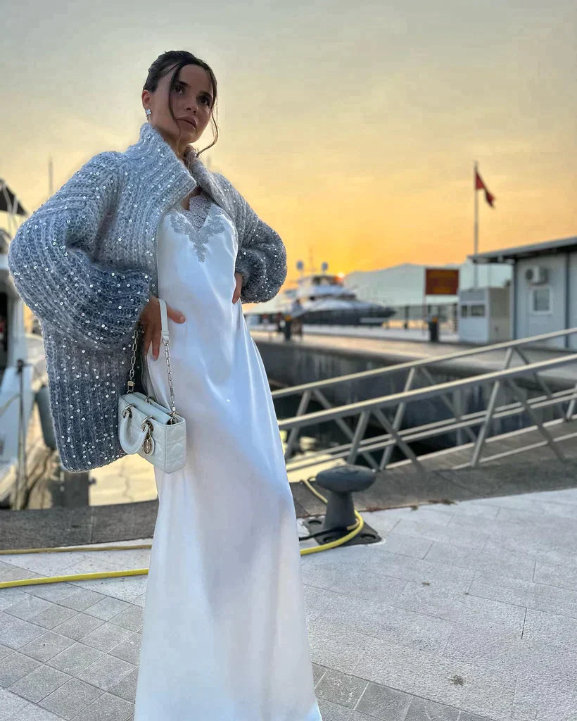 Selina - De elegante, glinsterende vesttrui met zijwaarts vest