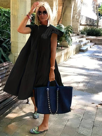 Gerafelde jurk met ronde hals