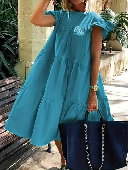 Gerafelde jurk met ronde hals