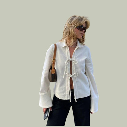 Gestructureerd vest met uitlopende mouwen