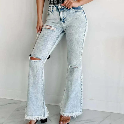 Uitlopende jeans met scheuren