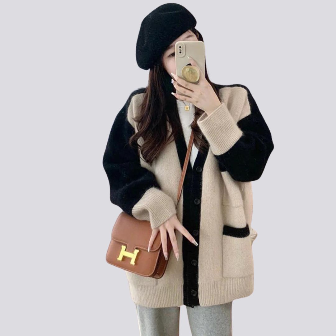 Oversized gebreid vest met contrasterende manchetten