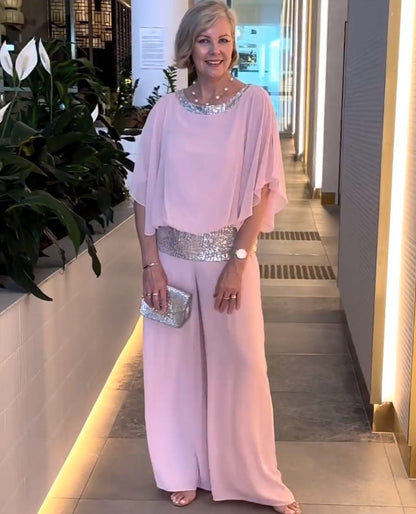Elegante tweedelige set met pailletten en kleurrijke blokken