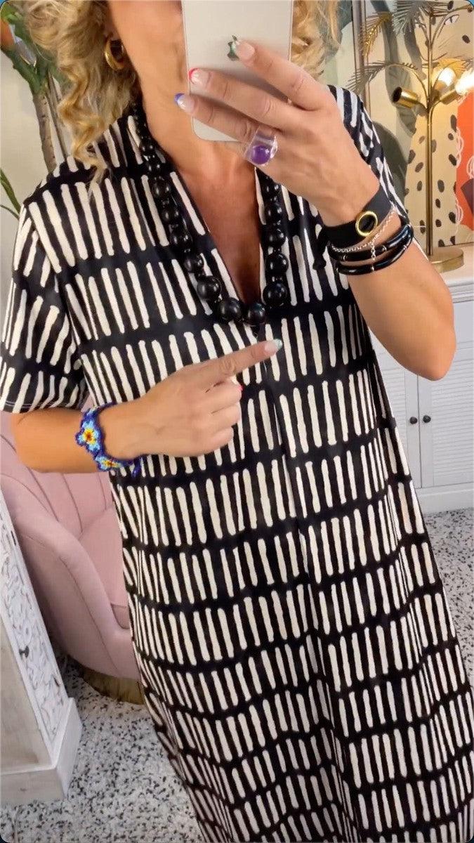 Sarah | Maxi-jurk met korte mouwen en V-halslijn