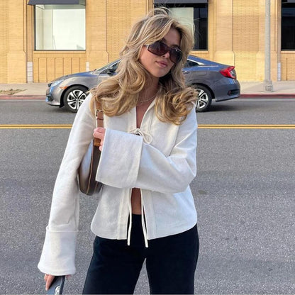 Gestructureerd vest met uitlopende mouwen