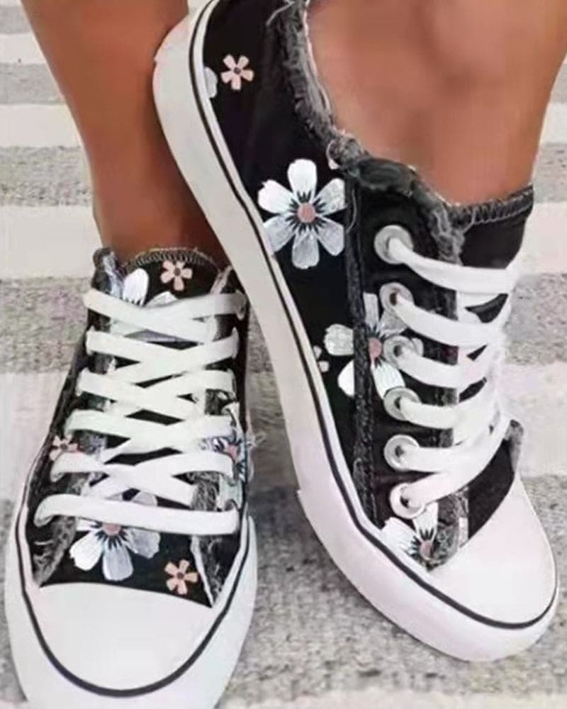 Denim sneaker met bloemen