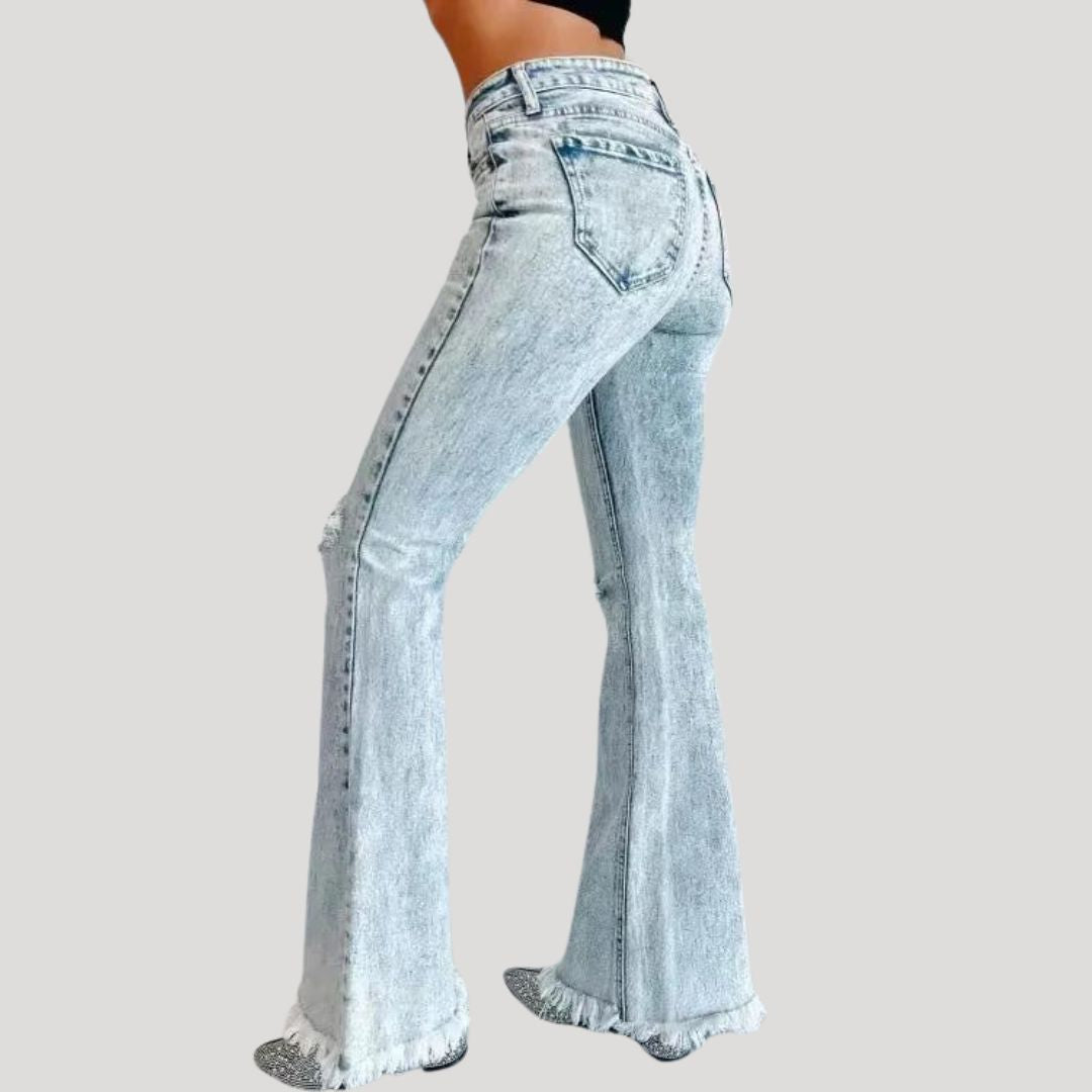 Uitlopende jeans met scheuren