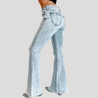 Uitlopende jeans met scheuren
