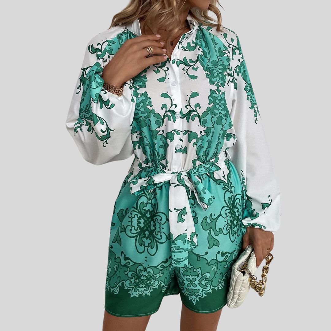 Chique playsuit met bloemenprint en tailleband