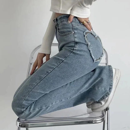 Stijlvolle jeans met hoge taille en hartvormig franje detail