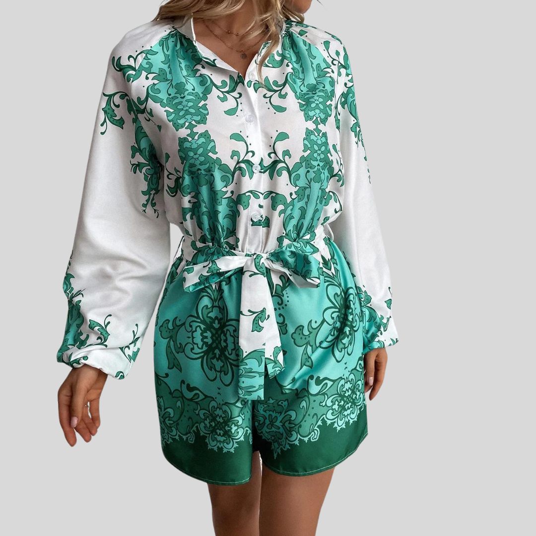 Chique playsuit met bloemenprint en tailleband