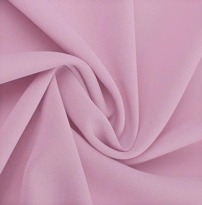 Elegante tweedelige set met pailletten en kleurrijke blokken