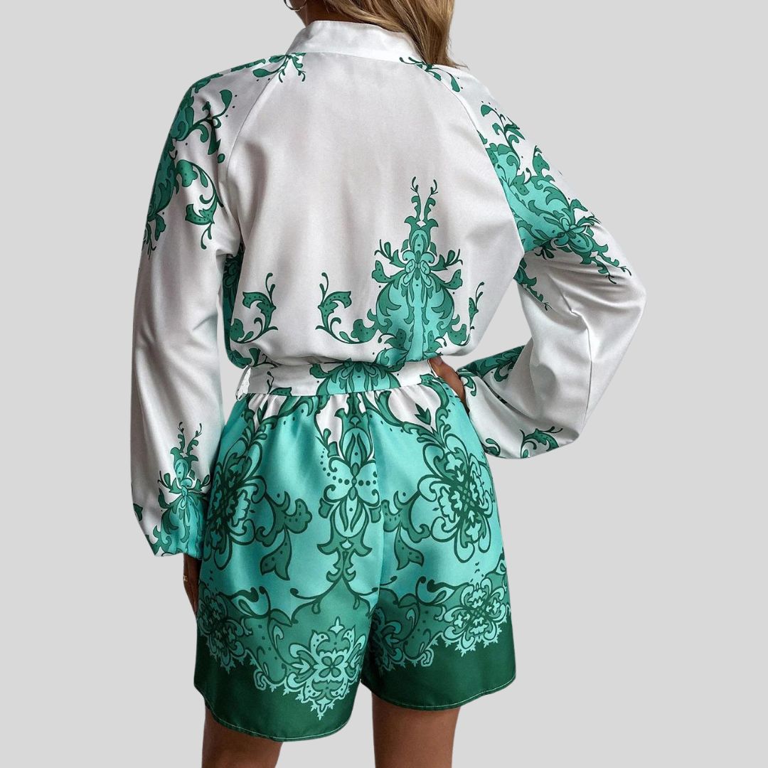 Chique playsuit met bloemenprint en tailleband