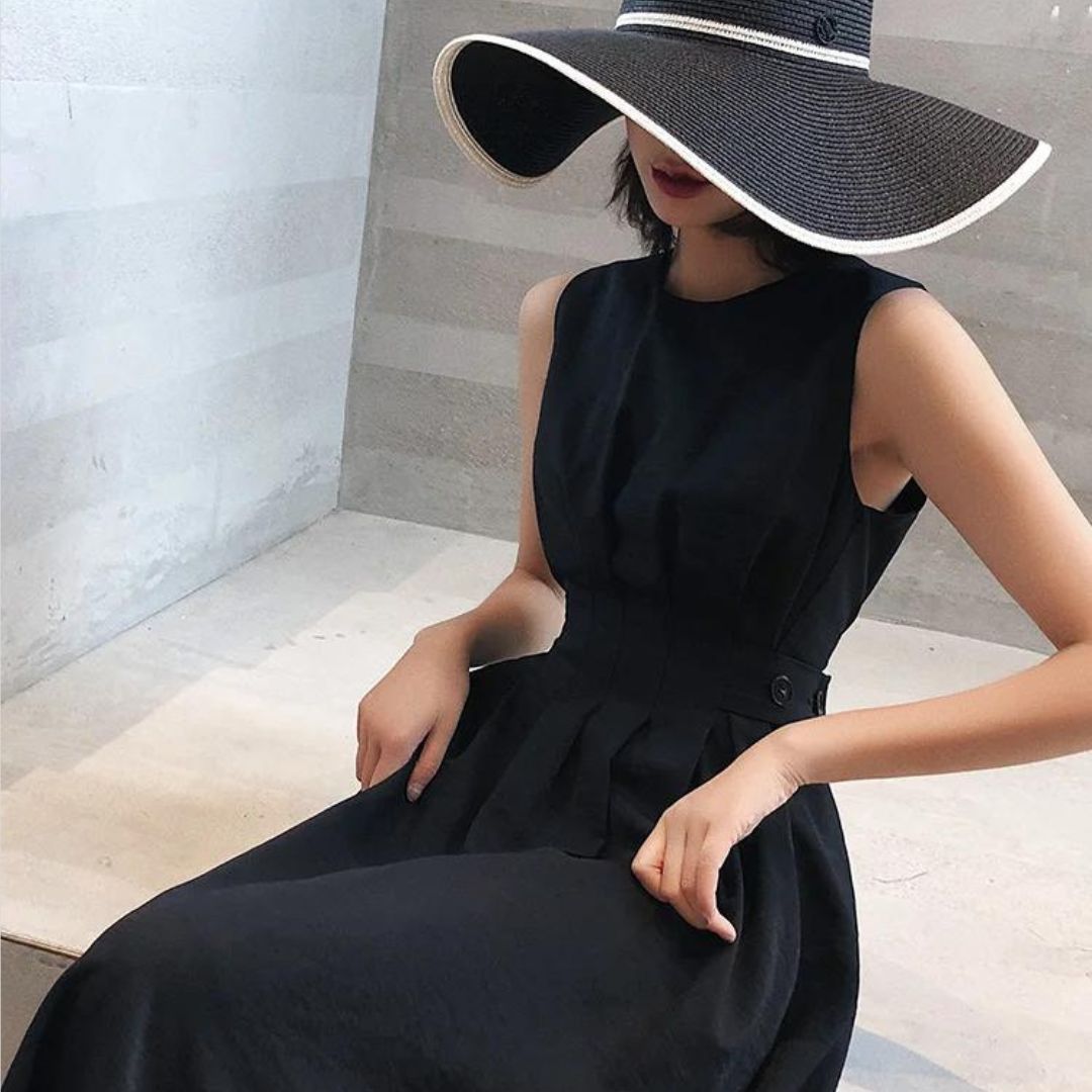 Mouwloze A-lijn midi-jurk met geaccentueerde taille