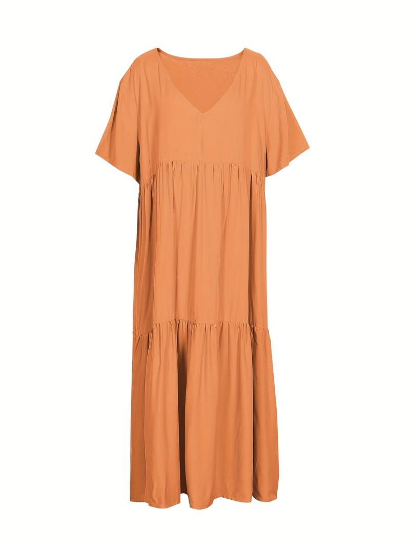 Onregelmatige veelkleurige swingjurk