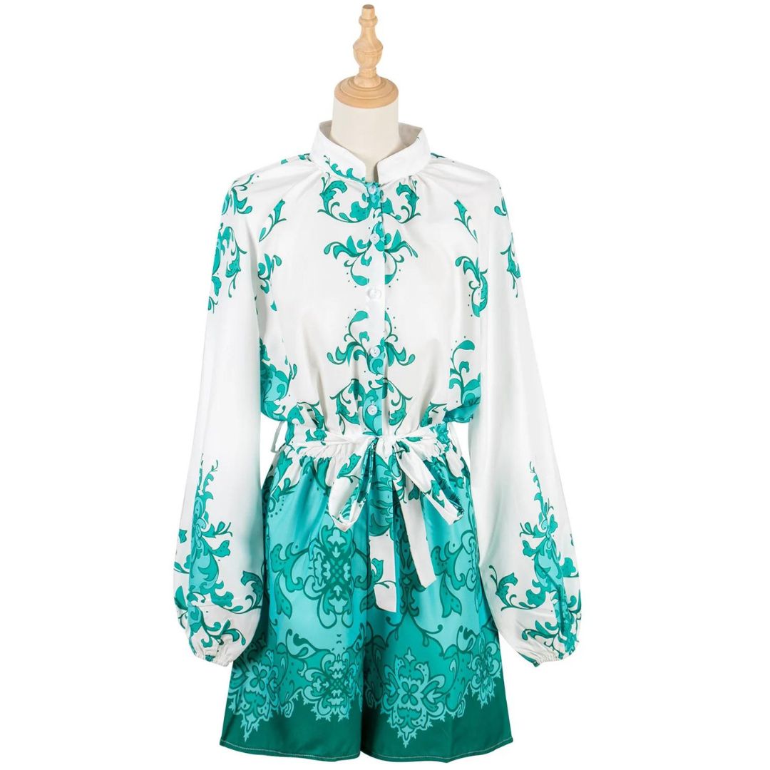 Chique playsuit met bloemenprint en tailleband