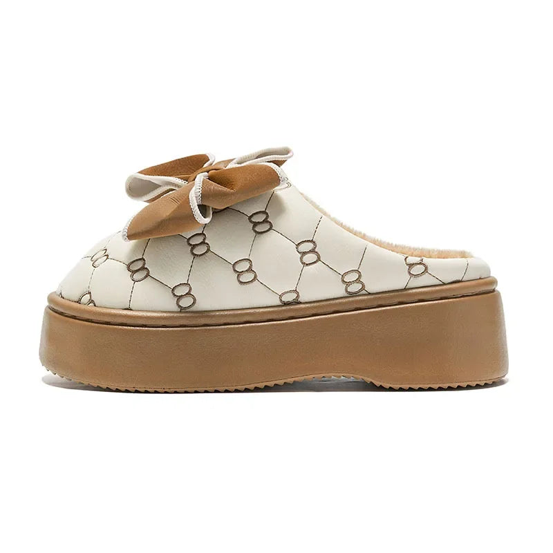 Elegante pantoffels met decoratie en strik