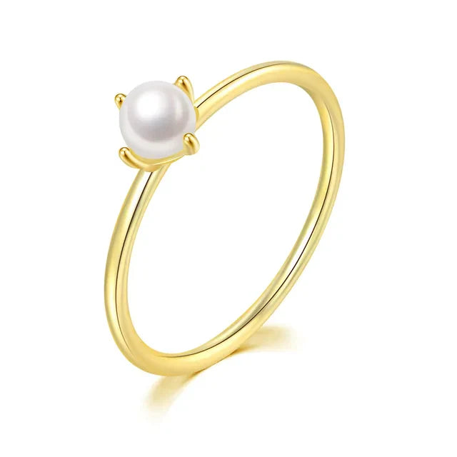 Minimalistische gouden ring met solitaire parel