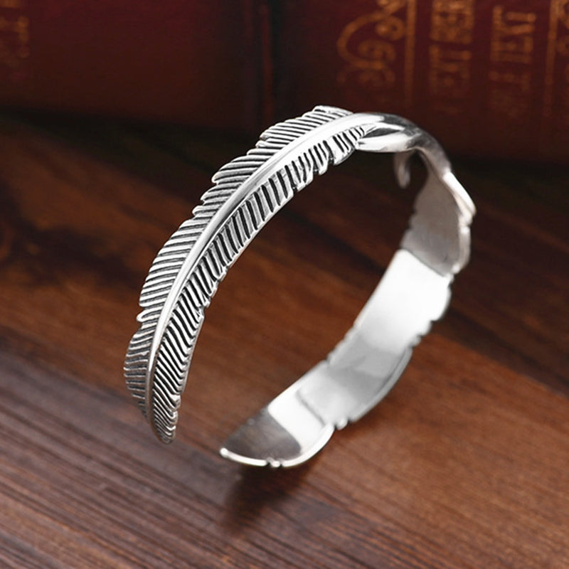 Sterling veren manchet armband met opengewerkt ontwerp