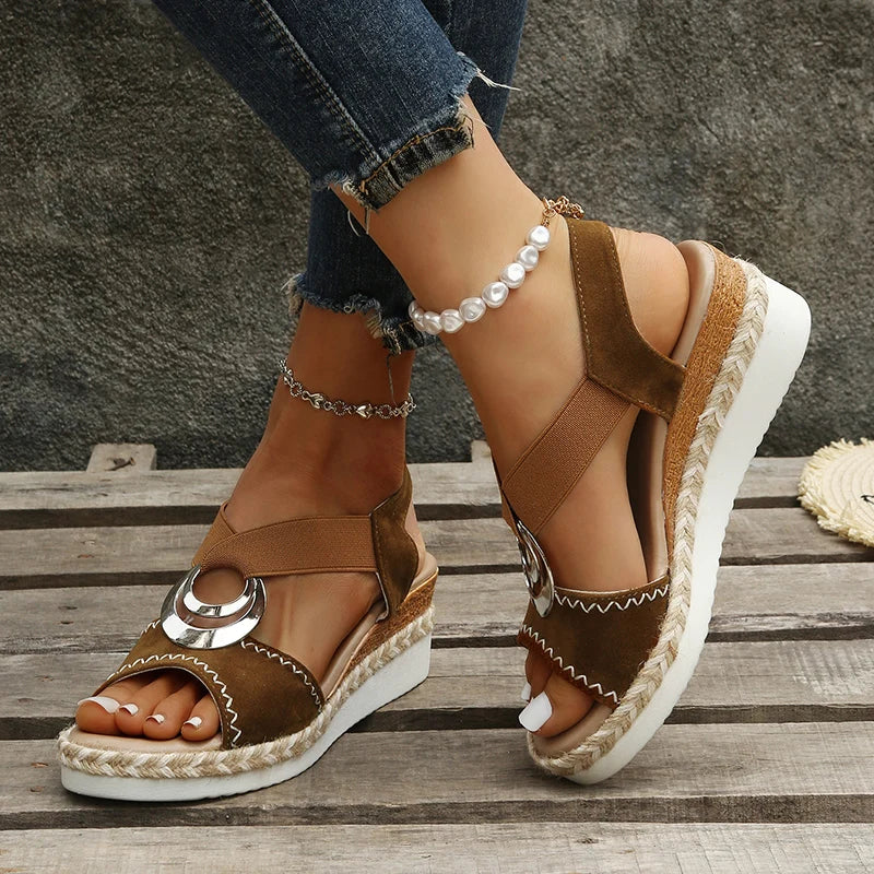 Sandalen met slangenprint en sleehak