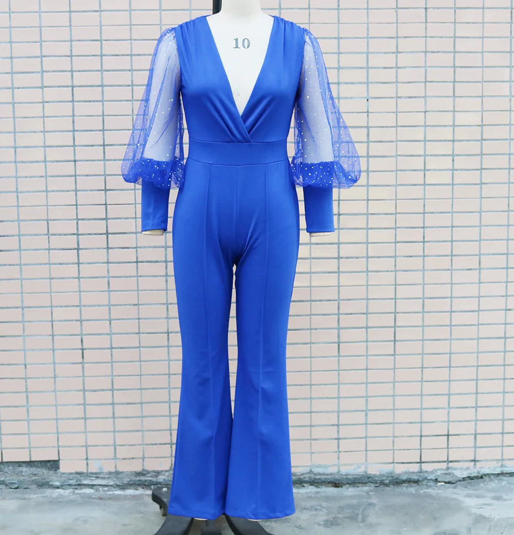 Jumpsuit met glitter en wijde pijpen