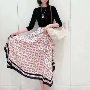 Geometrische printjurk met kant