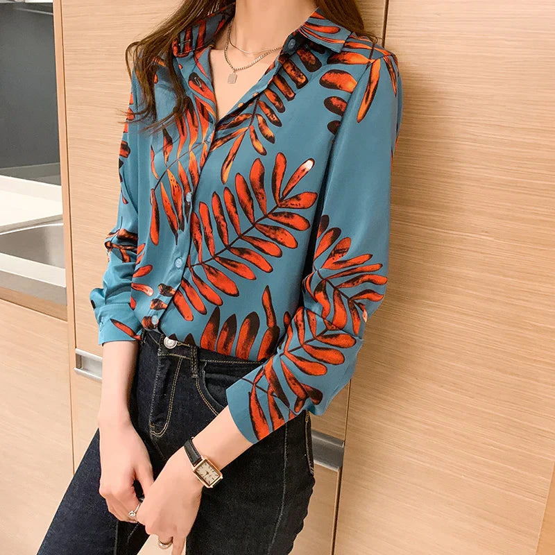 Elegante blouse met bladprint