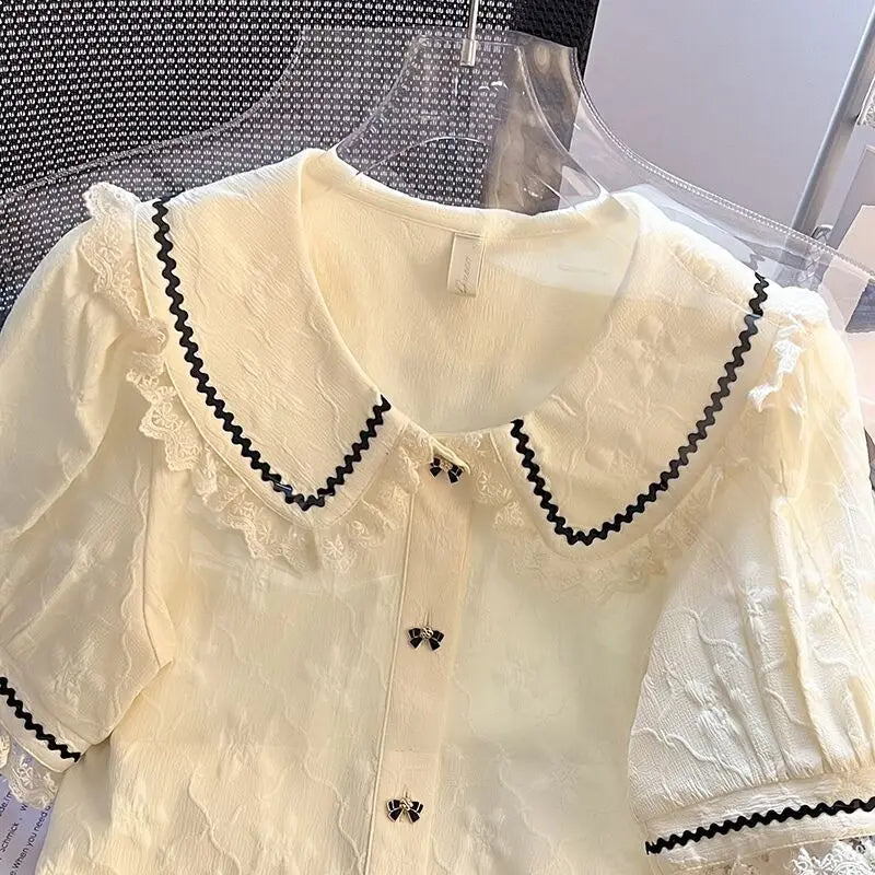 Elegante blouse met Peter Pan-kraag en pofmouwen in Franse stijl