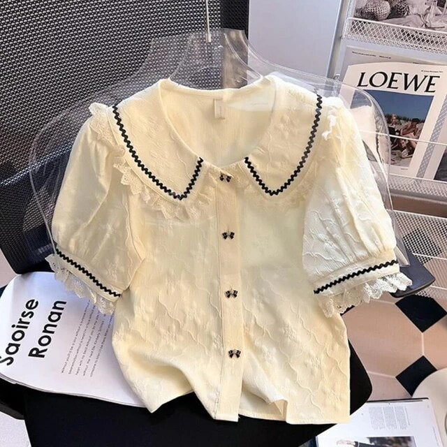 Elegante blouse met Peter Pan-kraag en pofmouwen in Franse stijl