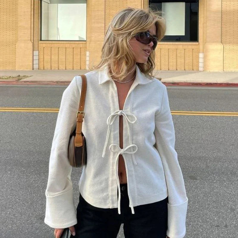 Gestructureerd vest met uitlopende mouwen