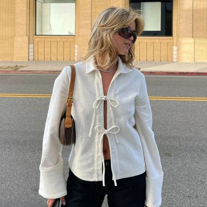 Gestructureerd vest met uitlopende mouwen