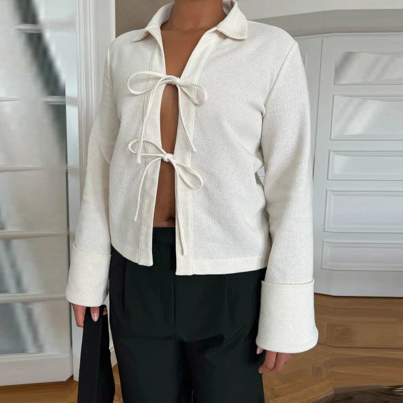 Gestructureerd vest met uitlopende mouwen